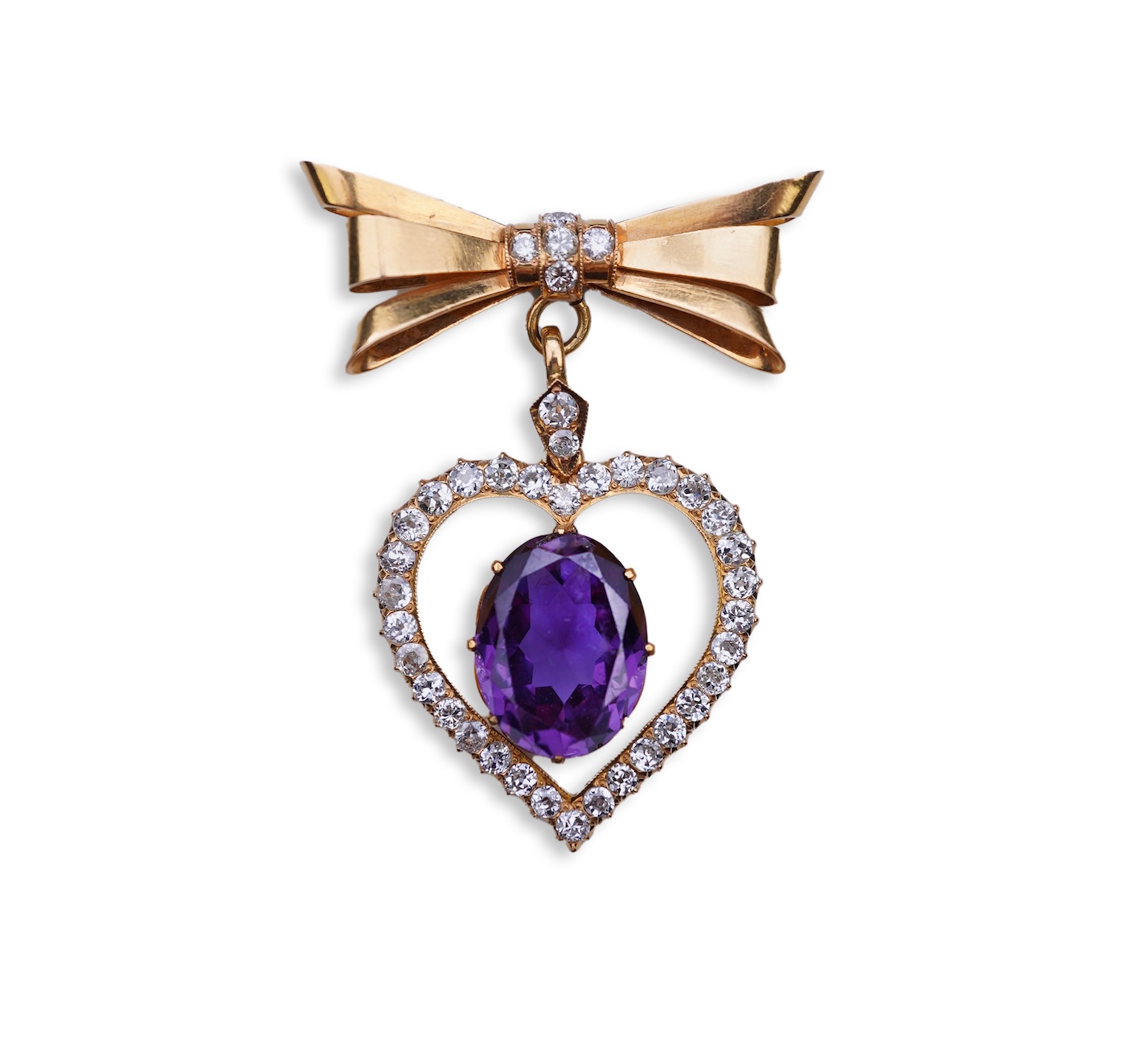 A synthetic sapphire and diamond pendant, mid 20th century